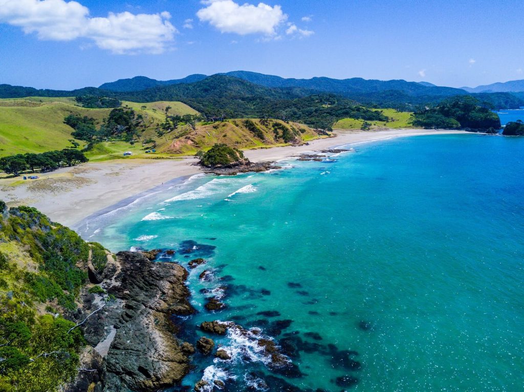 Beach in South Island. Image: Rod Long, Unsplash. 